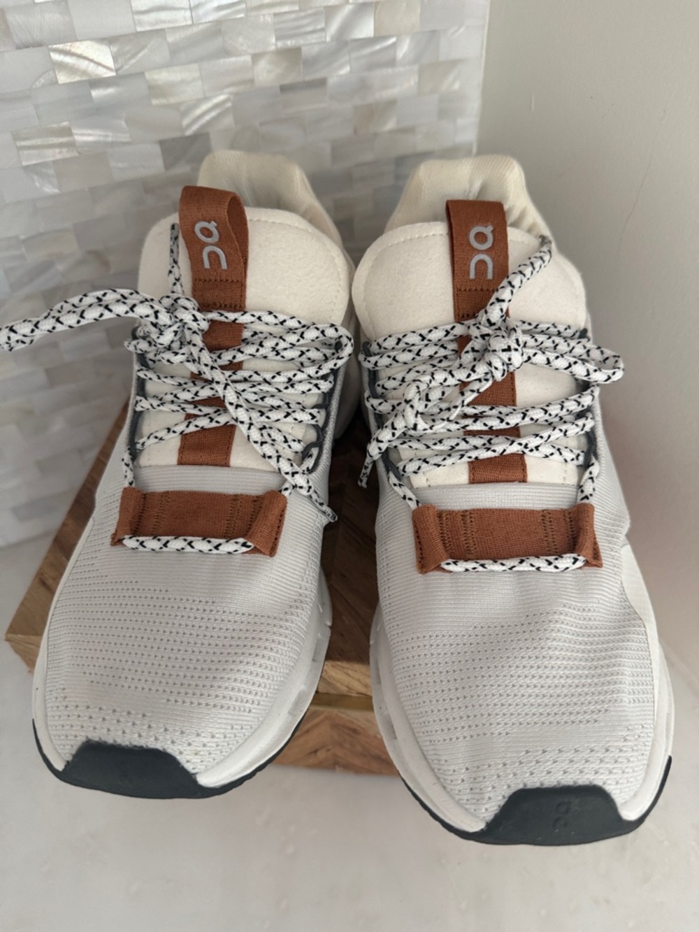 On Cloud Women’s Athletic Shoes in White with Tan Accents - Picture 2 of 6
